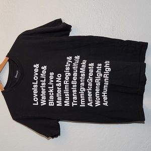 OMAZE Here To Stay Activist Graphic  Black T Shirt Medium Unisex